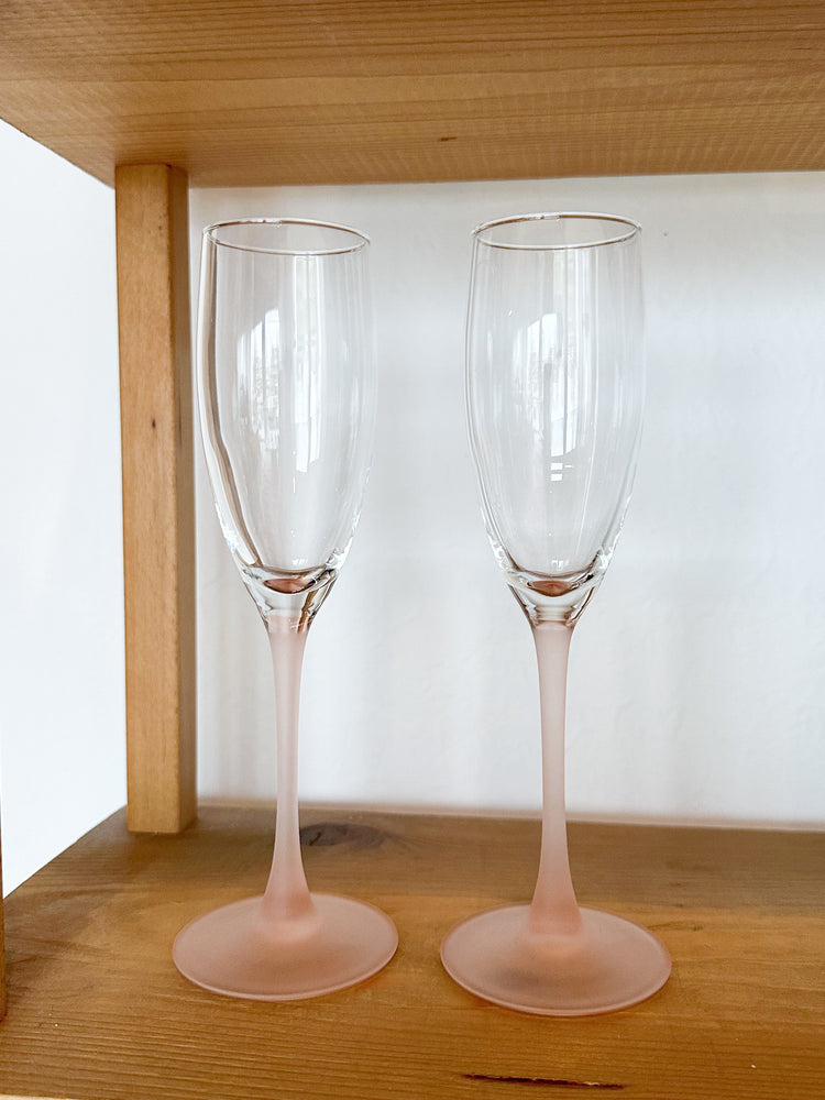 2 pink champagne glasses